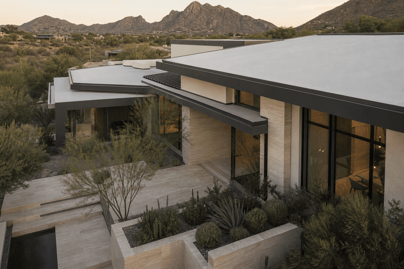 Contemporary Paradise Valley estate with low-slope elastomeric foam roof and bronze metal cladding